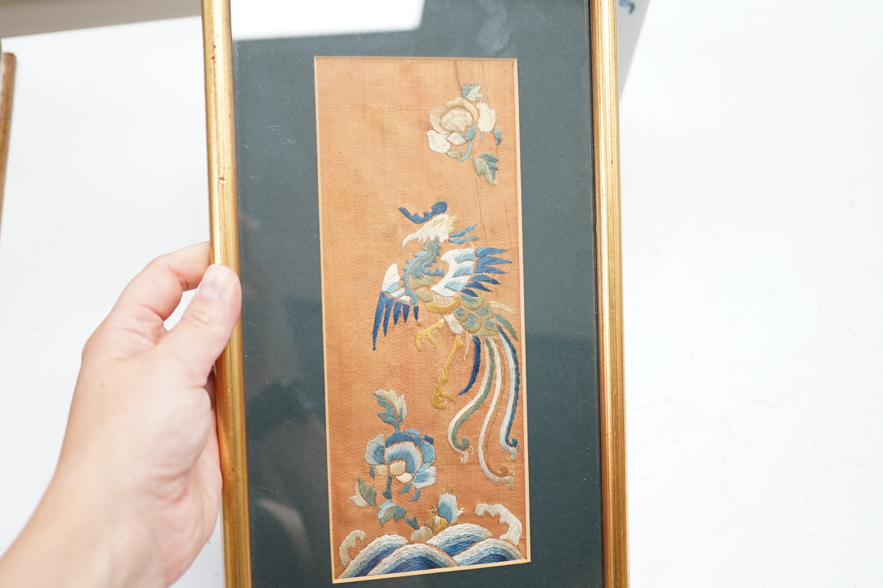 Two Chinese hardwood and mixed soapstone panels and a silk embroidered panel, largest 14.5cm x 29.5cm high